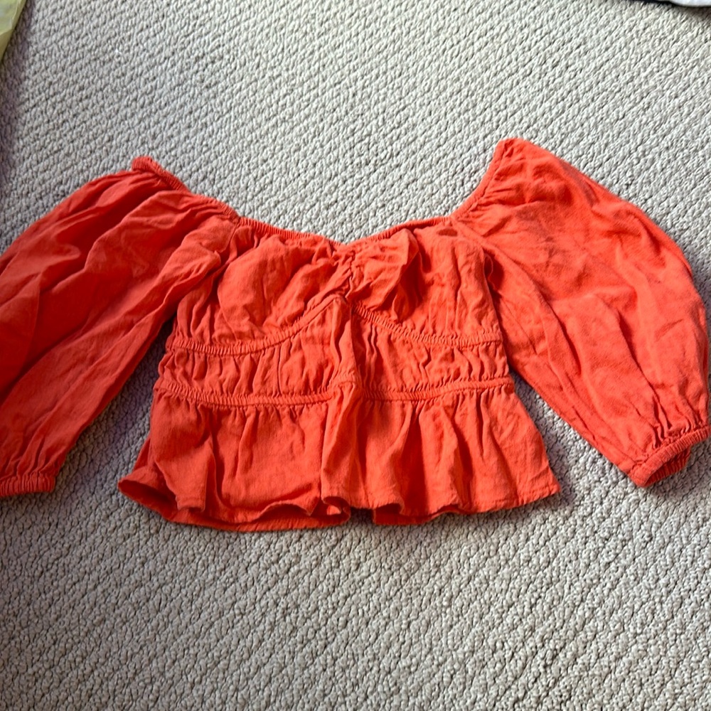 orange going out top